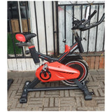 SX 100 Spin Bike — Adjustable Resistance, LCD Display, Transport Wheels